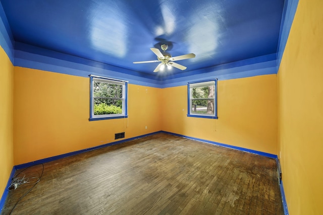 311 Rosehill Rd, Jackson, MI 49202 - unfurnished room with a ceiling fan, hardwood / wood-style flooring, and baseboards