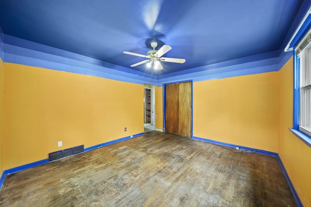 311 Rosehill Rd, Jackson, MI 49202 - spare room featuring ceiling fan, hardwood / wood-style floors, and baseboards