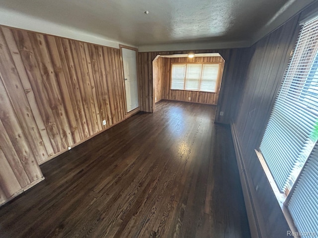 18821 Dalby, Redford, MI 48240 - unfurnished room featuring wood walls and dark wood finished floors