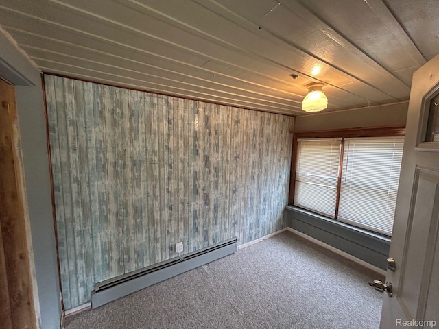 18821 Dalby, Redford, MI 48240 - unfurnished room featuring a baseboard radiator, carpet flooring, wooden walls, and baseboards