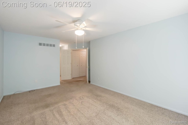43221 Pointe Dr Unit 57, Clinton Township, MI 48038 - empty room featuring light carpet and ceiling fan