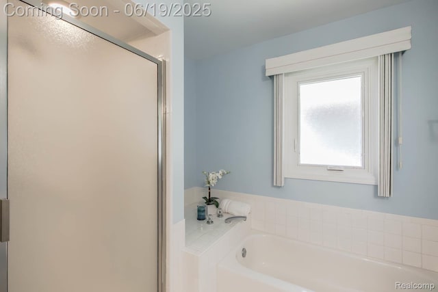43221 Pointe Dr Unit 57, Clinton Township, MI 48038 - full bathroom with a shower stall and a garden tub
