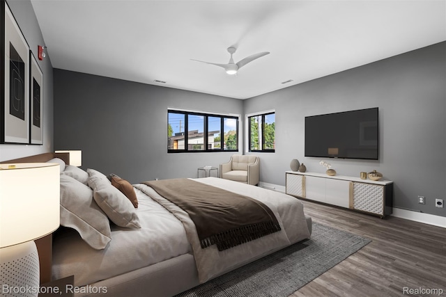 1711 Livernois St Unit 7, Ferndale, MI 48220 - bedroom featuring wood finished floors, baseboards, and a ceiling fan