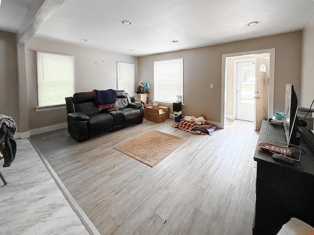 19549 Melrose Ave, Southfield, MI 48075 - living room featuring baseboards, light wood-style flooring, and recessed lighting