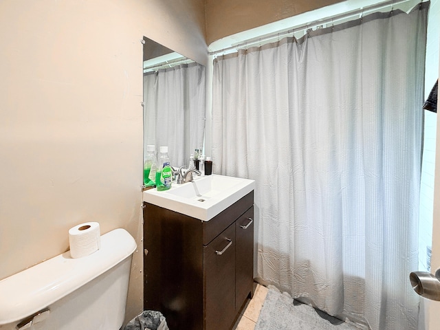 19549 Melrose Ave, Southfield, MI 48075 - bathroom with toilet, vanity, tile patterned floors, and curtained shower