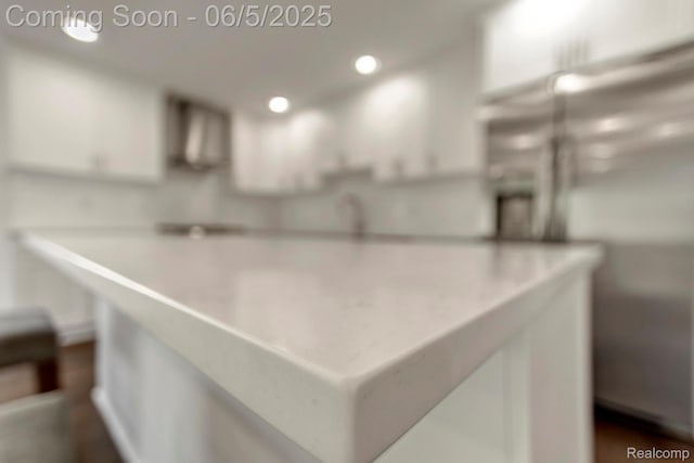 1285 Ruffner Ave, Birmingham, MI 48009 - kitchen view of white cabinetry, light countertops, and recessed lighting