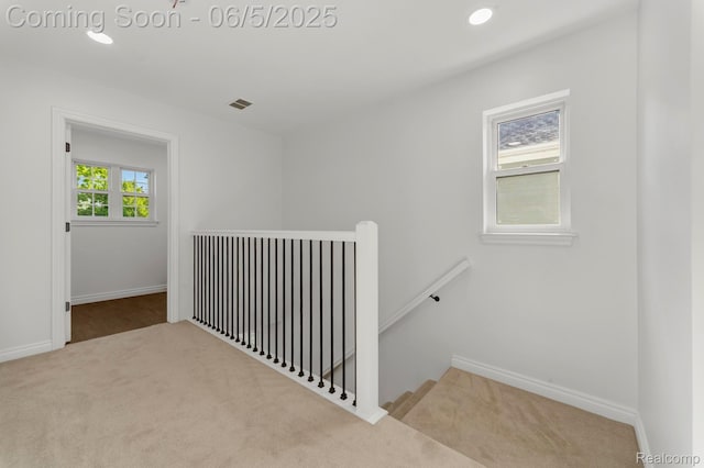 1285 Ruffner Ave, Birmingham, MI 48009 - hall with an upstairs landing, carpet floors, baseboards, and recessed lighting