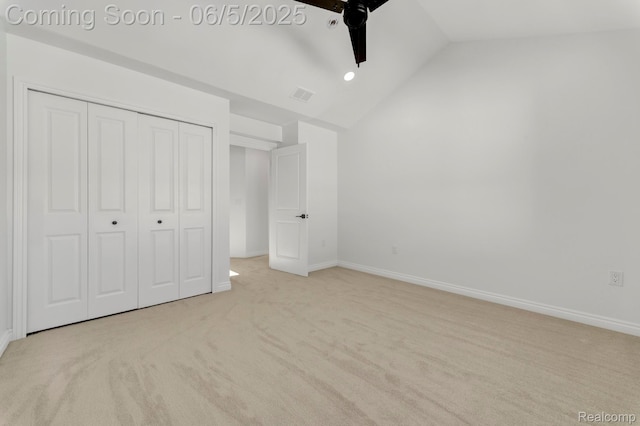 1285 Ruffner Ave, Birmingham, MI 48009 - unfurnished bedroom with carpet flooring, vaulted ceiling, a closet, baseboards, and ceiling fan