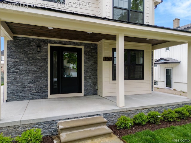 1285 Ruffner Ave, Birmingham, MI 48009 - doorway to property featuring a porch and stone siding