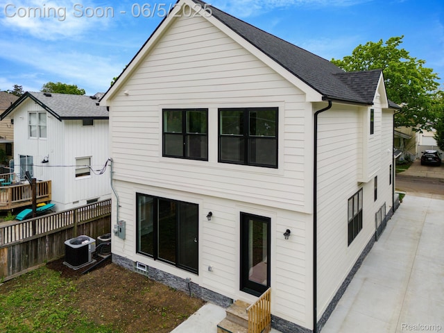 1285 Ruffner Ave, Birmingham, MI 48009 - rear view of property with entry steps, cooling unit, and a shingled roof