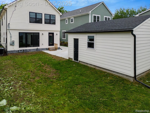 1285 Ruffner Ave, Birmingham, MI 48009 - rear view of property featuring a lawn, a patio, entry steps, and central AC unit