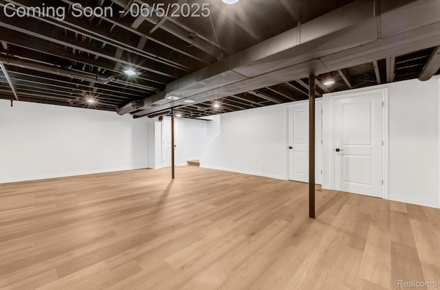 1285 Ruffner Ave, Birmingham, MI 48009 - finished basement featuring wood finished floors and baseboards