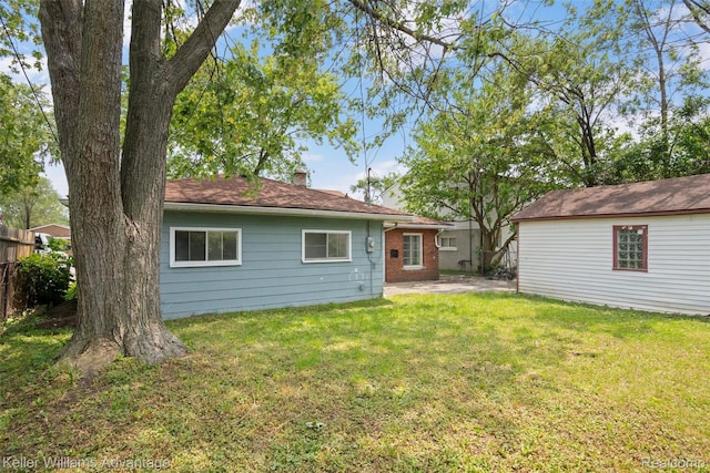26315 Lehner St, Roseville, MI 48066 - back of house with a chimney and a patio area