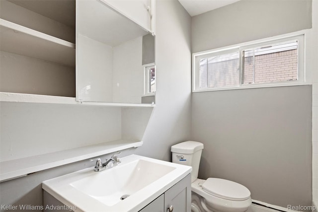 26315 Lehner St, Roseville, MI 48066 - bathroom featuring toilet, vanity, and baseboard heating