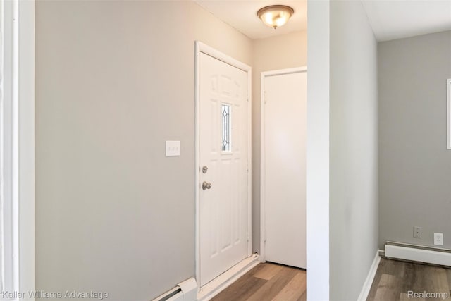 26315 Lehner St, Roseville, MI 48066 - entrance foyer featuring wood finished floors, baseboard heating, and baseboards