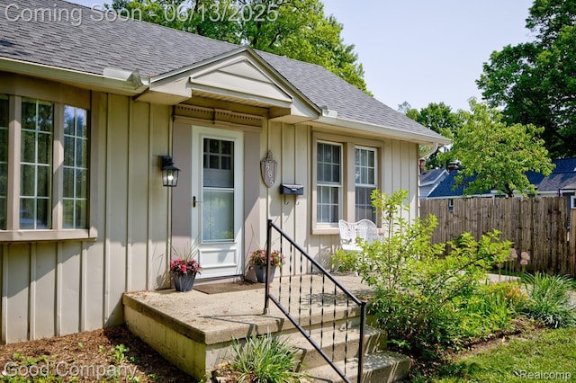 585 Roth Blvd, Clawson, MI 48017 - property entrance featuring board and batten siding and a shingled roof