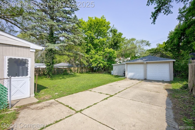 585 Roth Blvd, Clawson, MI 48017 - view of yard with an outbuilding and a garage