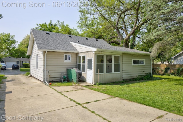 585 Roth Blvd, Clawson, MI 48017 - rear view of property featuring roof with shingles