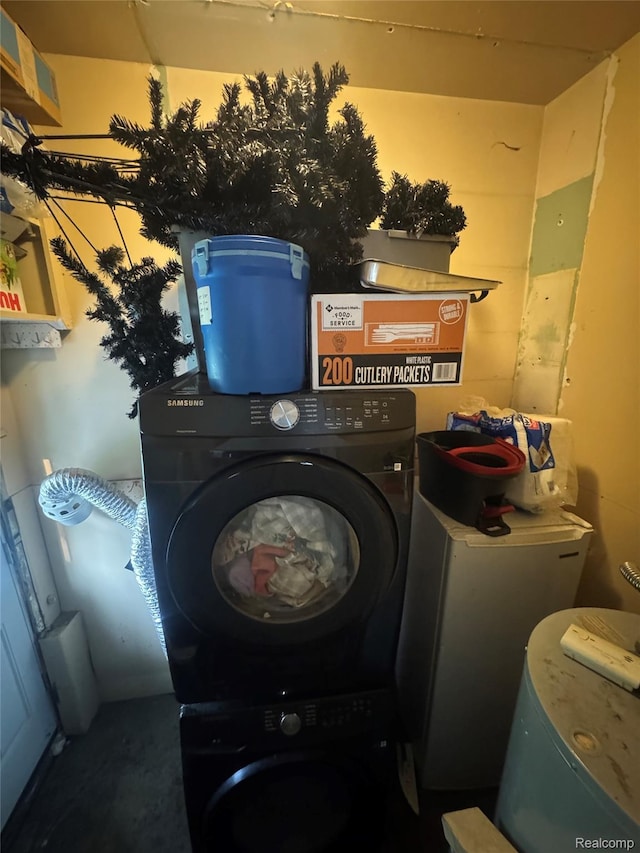 14251 Hobart Ave, Warren, MI 48089 - washroom featuring estacked washer and dryer