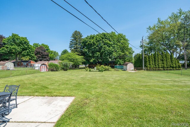 1312 N Bielby St, Waterford, MI 48328 - view of yard featuring a patio