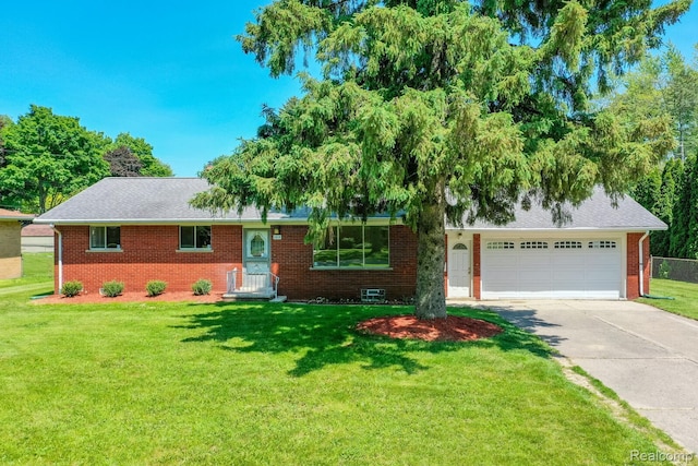 1312 N Bielby St, Waterford, MI 48328 - single story home featuring concrete driveway, brick siding, a front lawn, and a garage