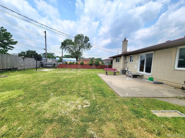 11618 Highland Dr, Warren, MI 48089 - view of yard with a patio and central AC