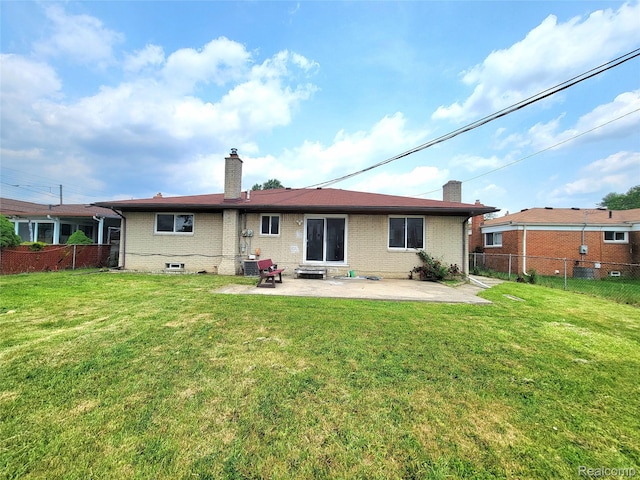 11618 Highland Dr, Warren, MI 48089 - rear view of property with a chimney, a patio area, and brick siding