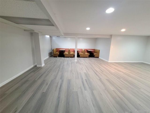 11618 Highland Dr, Warren, MI 48089 - finished below grade area with recessed lighting, baseboards, and wood finished floors