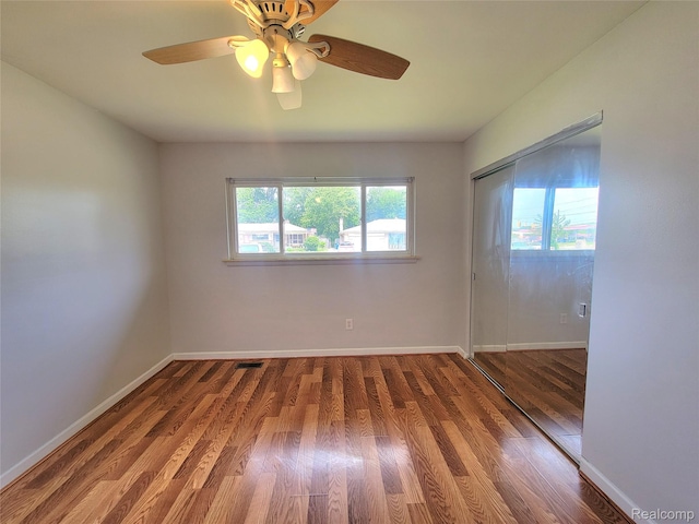 11618 Highland Dr, Warren, MI 48089 - unfurnished room with ceiling fan, wood finished floors, and baseboards