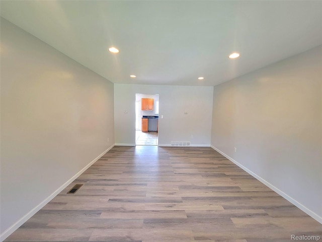 11618 Highland Dr, Warren, MI 48089 - unfurnished room featuring recessed lighting, light wood finished floors, and baseboards