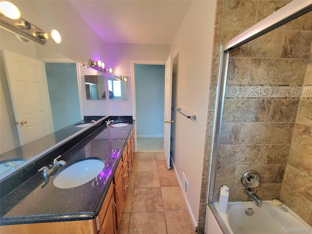 11618 Highland Dr, Warren, MI 48089 - full bath featuring double vanity,  shower combination, stone finish flooring, and baseboards