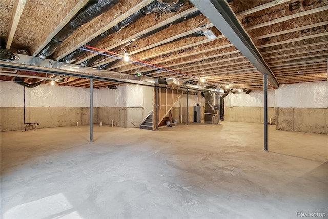 3660 Hayes Ct, Ypsilanti, MI 48197 - unfinished below grade area featuring stairway, water heater, and heating unit