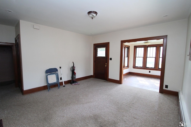 624 Waterloo Ave, Monroe, MI 48161 - carpeted entryway featuring a baseboard heating unit and baseboards