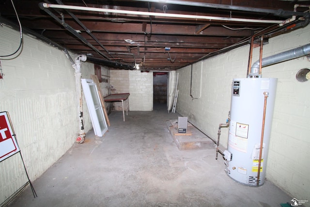 624 Waterloo Ave, Monroe, MI 48161 - unfinished basement with water heater and concrete block wall