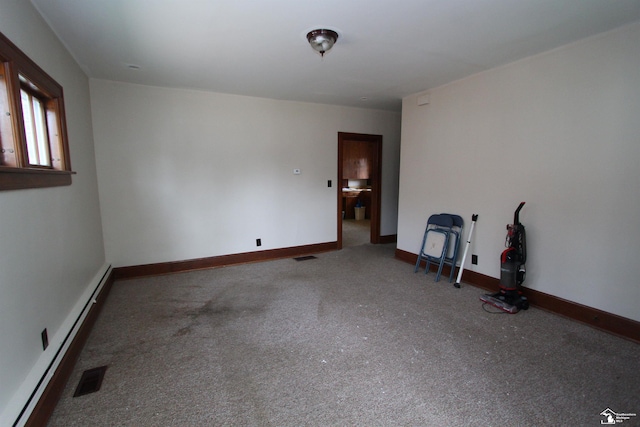 624 Waterloo Ave, Monroe, MI 48161 - empty room featuring carpet flooring, a baseboard radiator, and baseboards