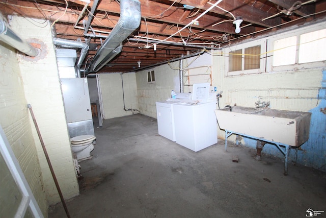 624 Waterloo Ave, Monroe, MI 48161 - basement with separate washer and dryer and a sink