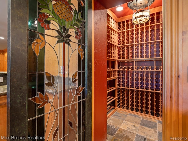 2921 Turtle Pond Ct, Bloomfield Hills, MI 48302 - wine room featuring stone tile floors and recessed lighting