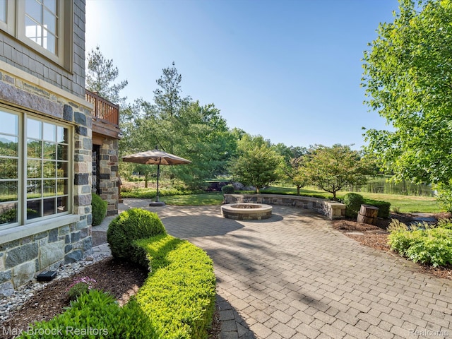 2921 Turtle Pond Ct, Bloomfield Hills, MI 48302 - view of patio featuring an outdoor fire pit
