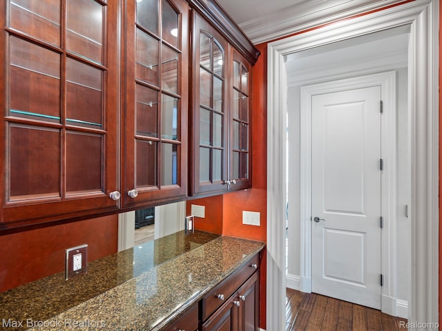 2921 Turtle Pond Ct, Bloomfield Hills, MI 48302 - bar area featuring crown molding, dark wood-type flooring, and baseboards
