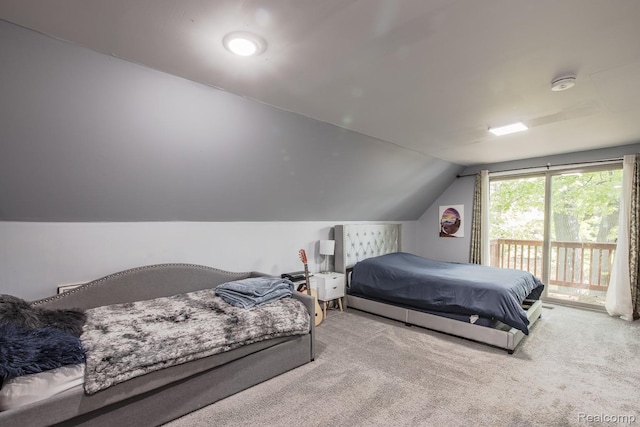 2475 S Ortonville Rd S, Ortonville, MI 48462 - carpeted bedroom featuring access to outside and lofted ceiling