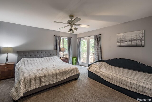 2475 S Ortonville Rd S, Ortonville, MI 48462 - carpeted bedroom featuring a ceiling fan and access to outside
