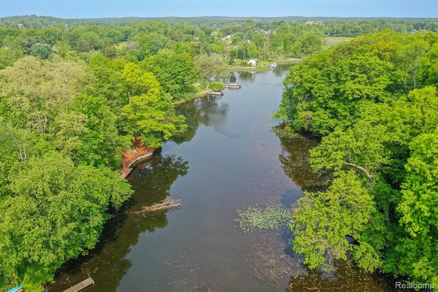 2475 S Ortonville Rd S, Ortonville, MI 48462 - drone / aerial view of a heavily wooded area and a large body of water