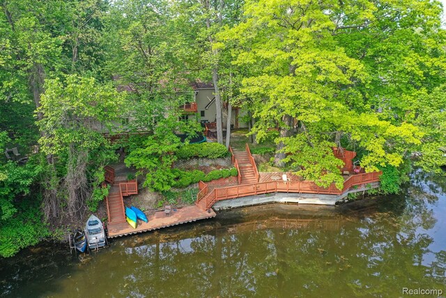2475 S Ortonville Rd S, Ortonville, MI 48462 - dock with stairs and a deck with water view