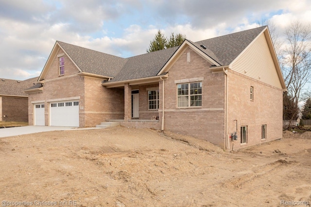 3201 Roma Ct, Wixom, MI 48393 - view of front of property featuring brick siding, concrete driveway, and a shingled roof