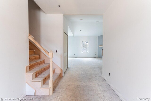 3201 Roma Ct, Wixom, MI 48393 - stairs with carpet flooring and baseboards