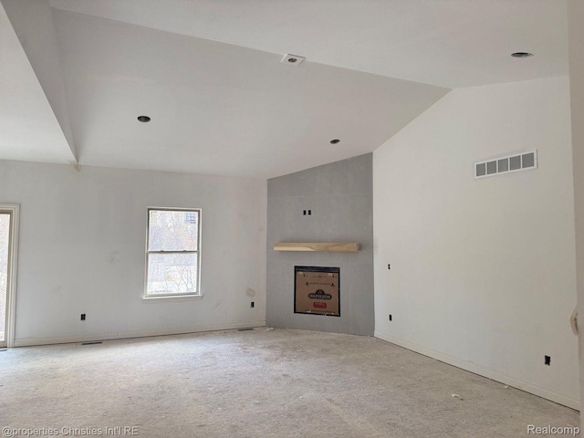 3201 Roma Ct, Wixom, MI 48393 - unfurnished living room featuring vaulted ceiling, carpet, and baseboards