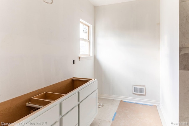 3201 Roma Ct, Wixom, MI 48393 - bathroom with tile patterned floors and baseboards