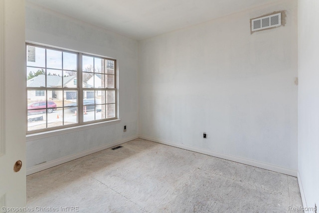 3201 Roma Ct, Wixom, MI 48393 - empty room with plenty of natural light and baseboards