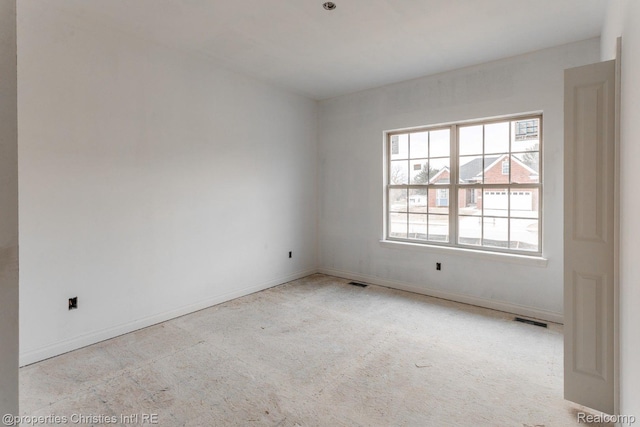 3201 Roma Ct, Wixom, MI 48393 - carpeted empty room with baseboards
