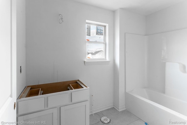 3201 Roma Ct, Wixom, MI 48393 - full bath featuring tile patterned flooring, baseboards, and tub / shower combination